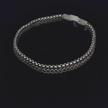 Load and play video in Gallery viewer, Double wire steel bracelet with curb
